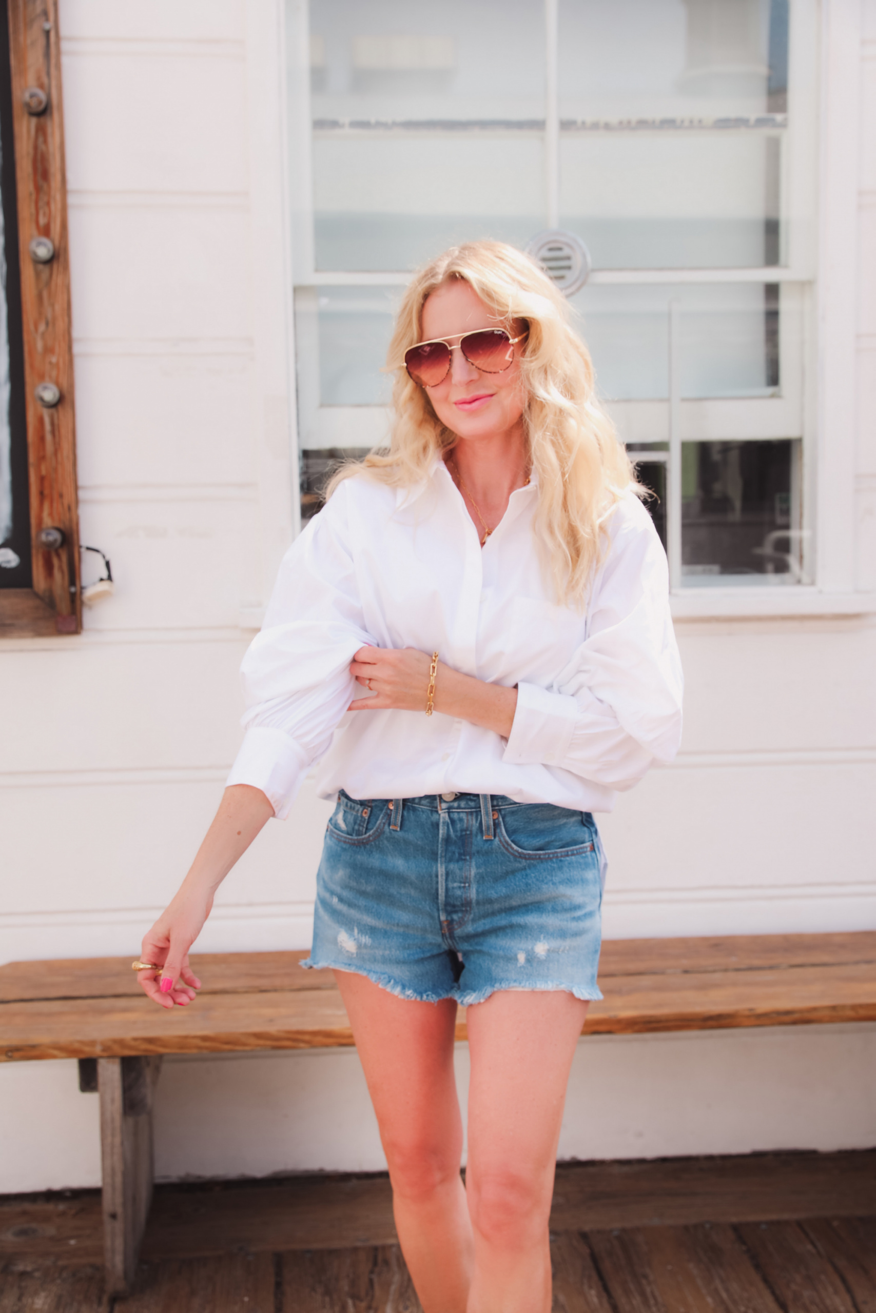 best white button down shirts, button down shorts over 40, how to find the perfect button dow shirt, white button down shirt, erin busbee, open edit oversized white button down shirt, why own a white button down shirt, levi's denim shorts, see by chloe espadrilles