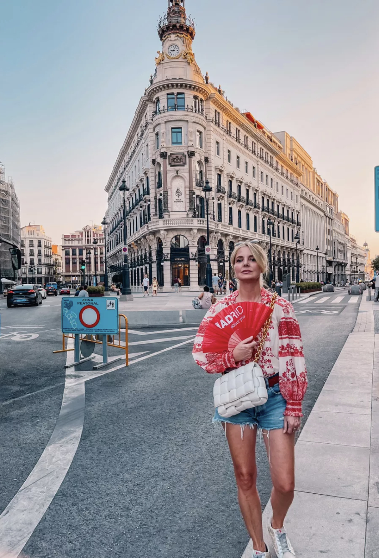move to spain, move to madrid, why move to spain, where to move in spain, moving to spain, how to move to spain, where to live in spain, Erin Busbee, white and red embroidered alice + olivia blouse with denim shorts by moussy