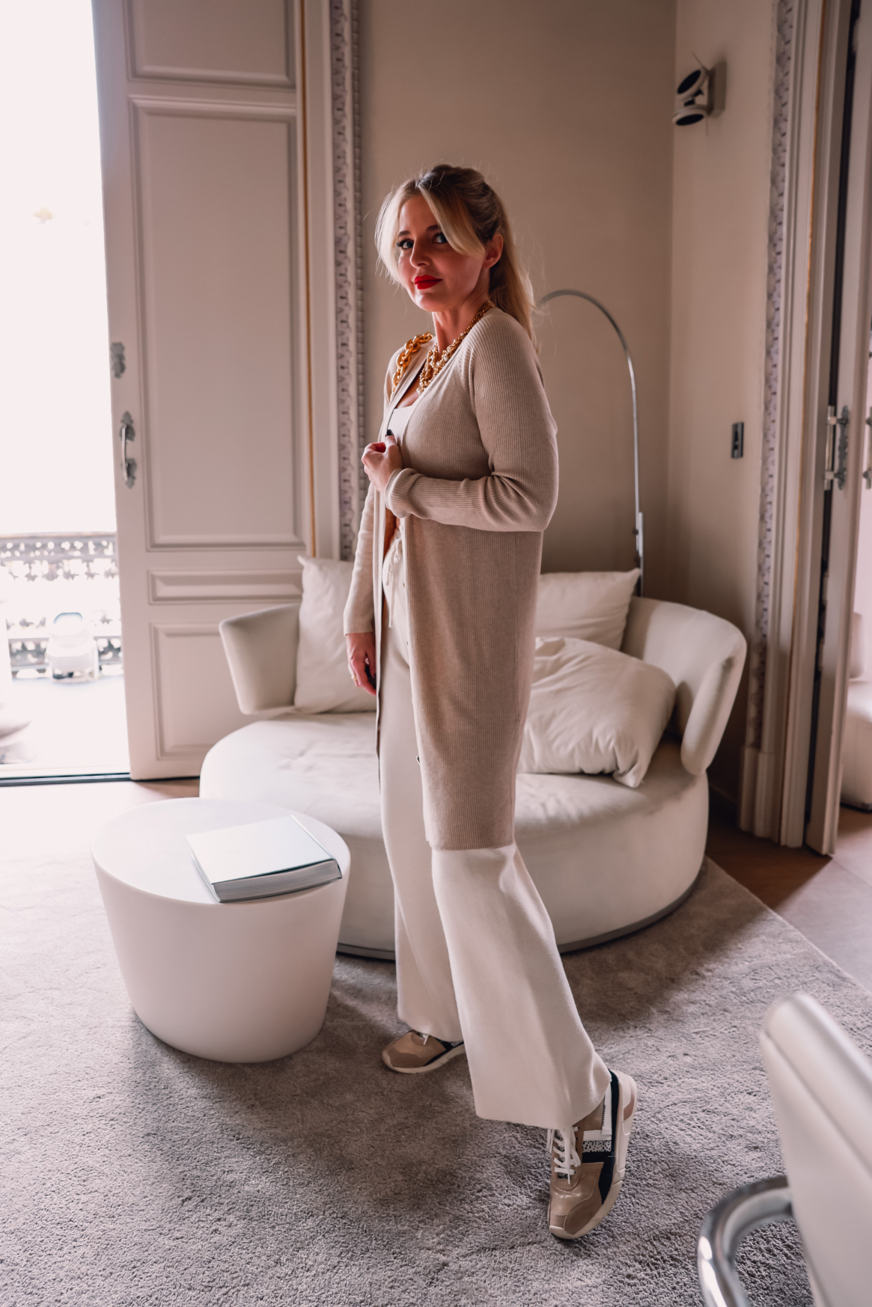 stylish loungewear, loungewear from couch to curb, how to transition loungewear, erin busbee, mango wide leg lounge pants, gola sneakers, mango cardigan, white cami crop top, el palauet, barcelona, spain