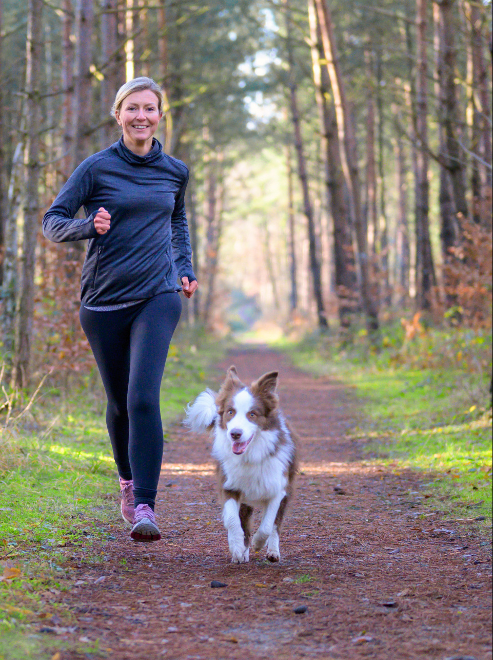 Self-Care Guide Woman Running with Dog in Forest