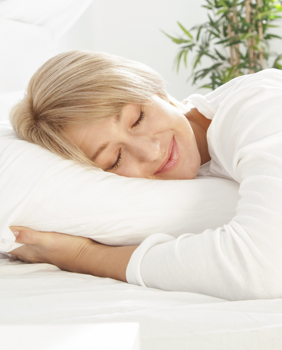 Self-care Guide, self-care habits, self-care in the new year. wellness in the new year. woman sleeping in white bed