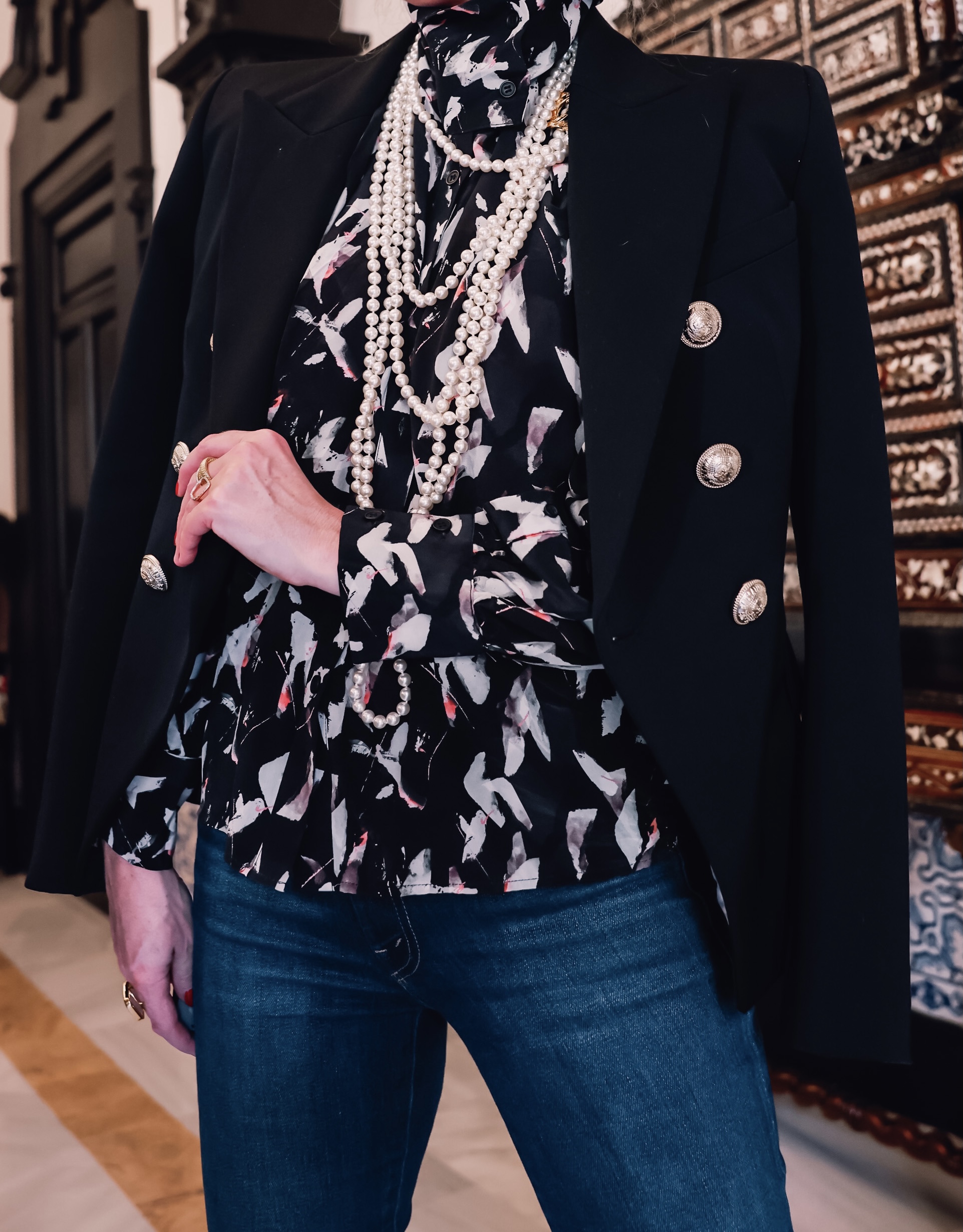 office outfits, stylish office outfits, chic office outfits, office outfits over 40, workwear over 40, stylish workwear, erin busbee, mother frayed hem flare jeans, balmain blazer, chanel multi strand necklace, iro printed blouse, black pointed toe pumps, sevilla, spain
