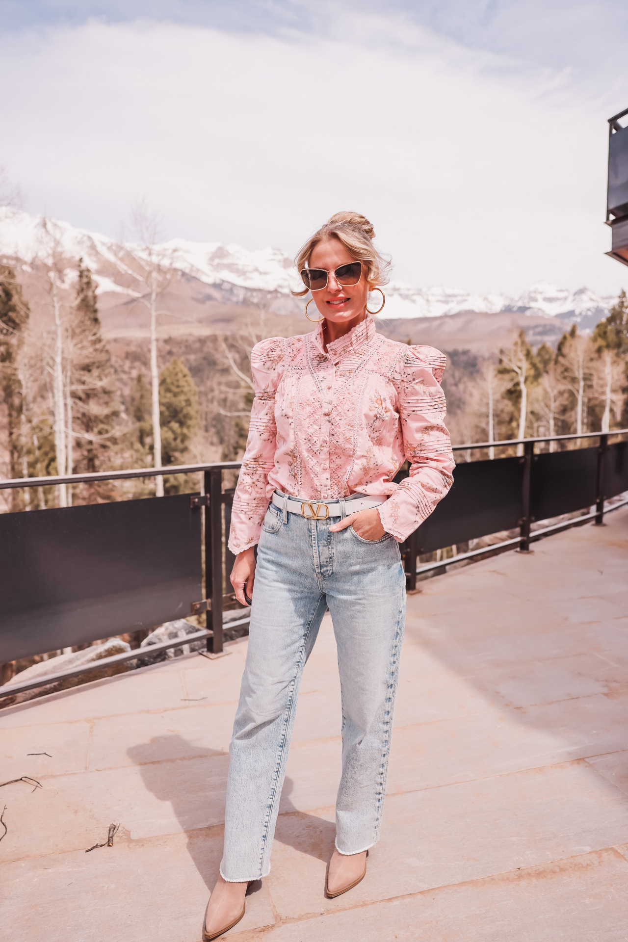 summer self care, summer self care essentials, sun protection, maui jim sunglasses, polarized sunglasses, puakenikeni sunglasses by maui jim, erin busbee, busbee style, telluride, colorado, loveshackfancy pink floral blouse, alice + olivia wide leg jeans, vince camuto booties, dean davidson gold hoops
