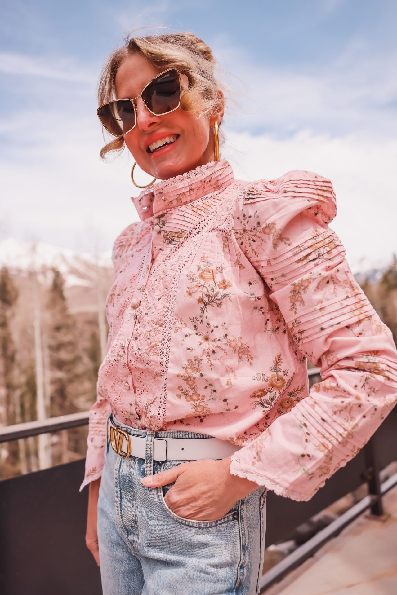 summer tops, best summer tops, casual summer tops, trendy summer tops, floral summer tops, loveshackfancy pink floral blouse, erin busbee, busbee style, fashion over 40, telluride, colorado, maui jim sunglasses, white valentino belt, alice + olivia baggy jeans, vince camuto booties