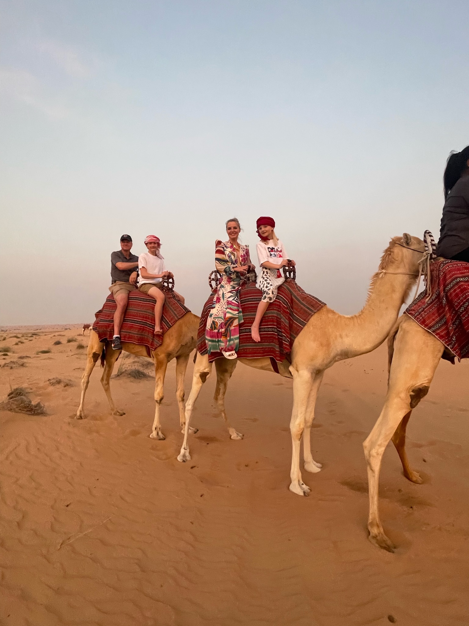 planning a trip to the middle east, where to go in the middle east, how to plan a trip to the middle east, dubai, united arab emirates, UAE, erin busbee, busbee style, busbee family travels, desert safari, platinum heritage desert safari, riding camels in desert, the empty quarter