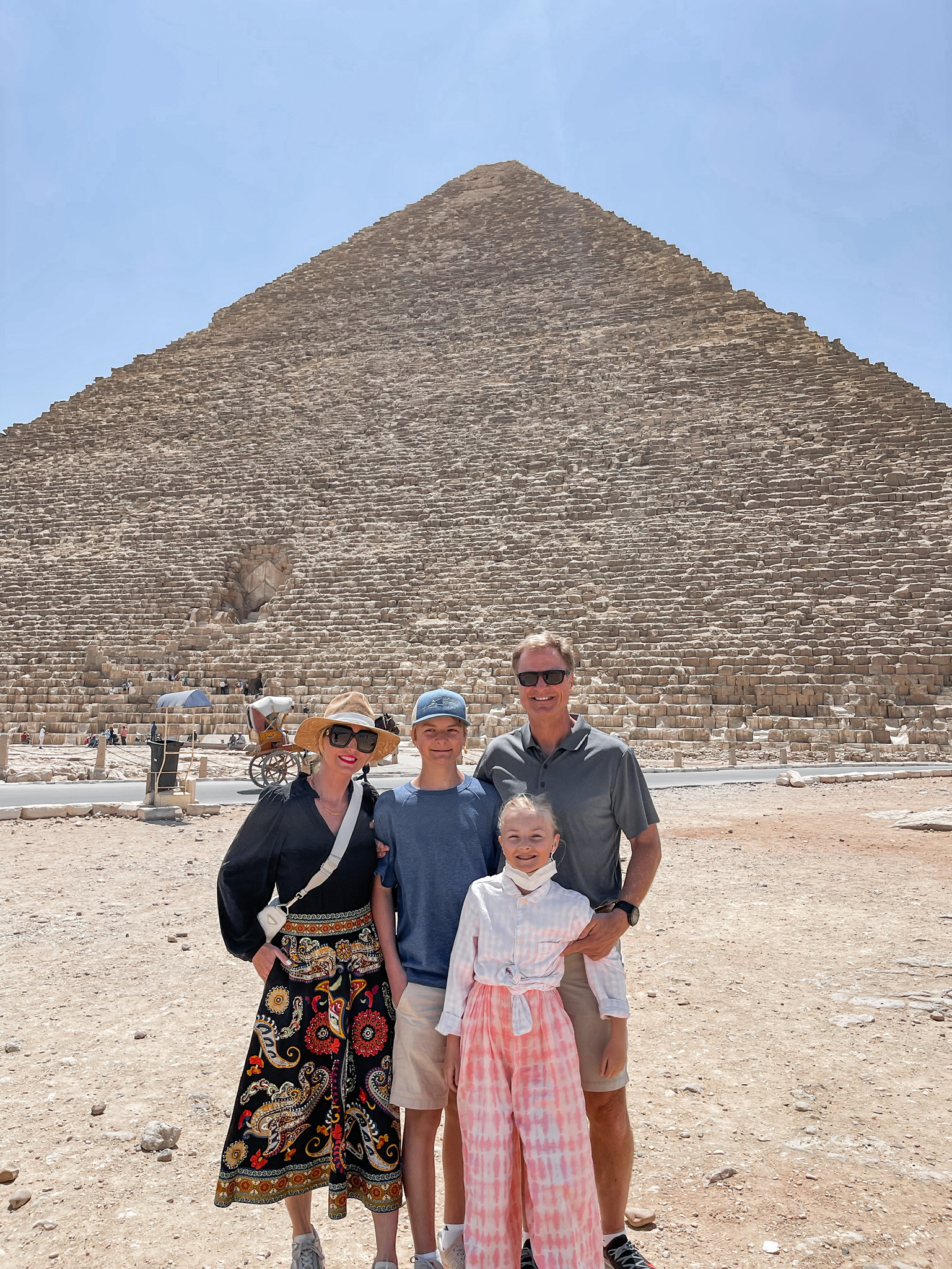 planning a trip to the middle east, where to go in the middle east, how to plan a trip to the middle east, The Great Pyramids of Giza, Egypt, Cairo Egypt, erin busbee, busbee style, busbee family travels, cairo trip, great pyramids of giza trip, father's day gift ideas, fashion blogger over 40 Erin Busbee husband and children in egypt, unique father's day gift ideas, unique father's day gifts, best father's day gifts