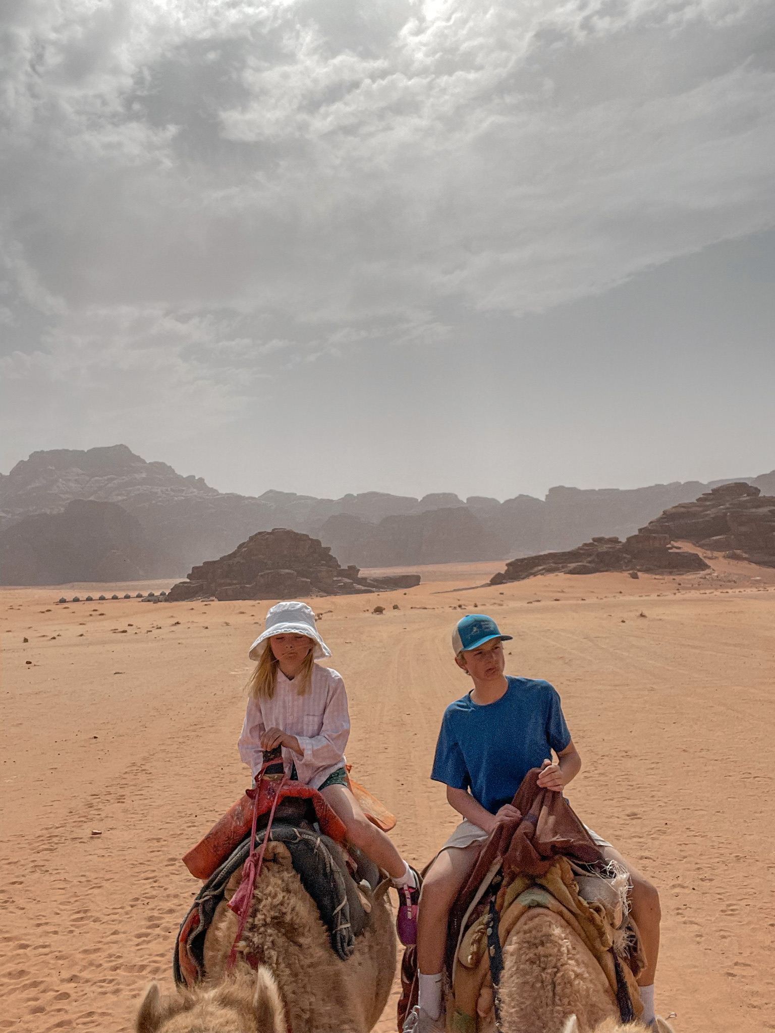 planning a trip to the middle east, where to go in the middle east, how to plan a trip to the middle east, Jordan, Jordan Desert, erin busbee, busbee style, busbee family travels, Jordan Desert trip, explore jordan desert, camel rides in jordan desert, wadi rum, Valley of the moon