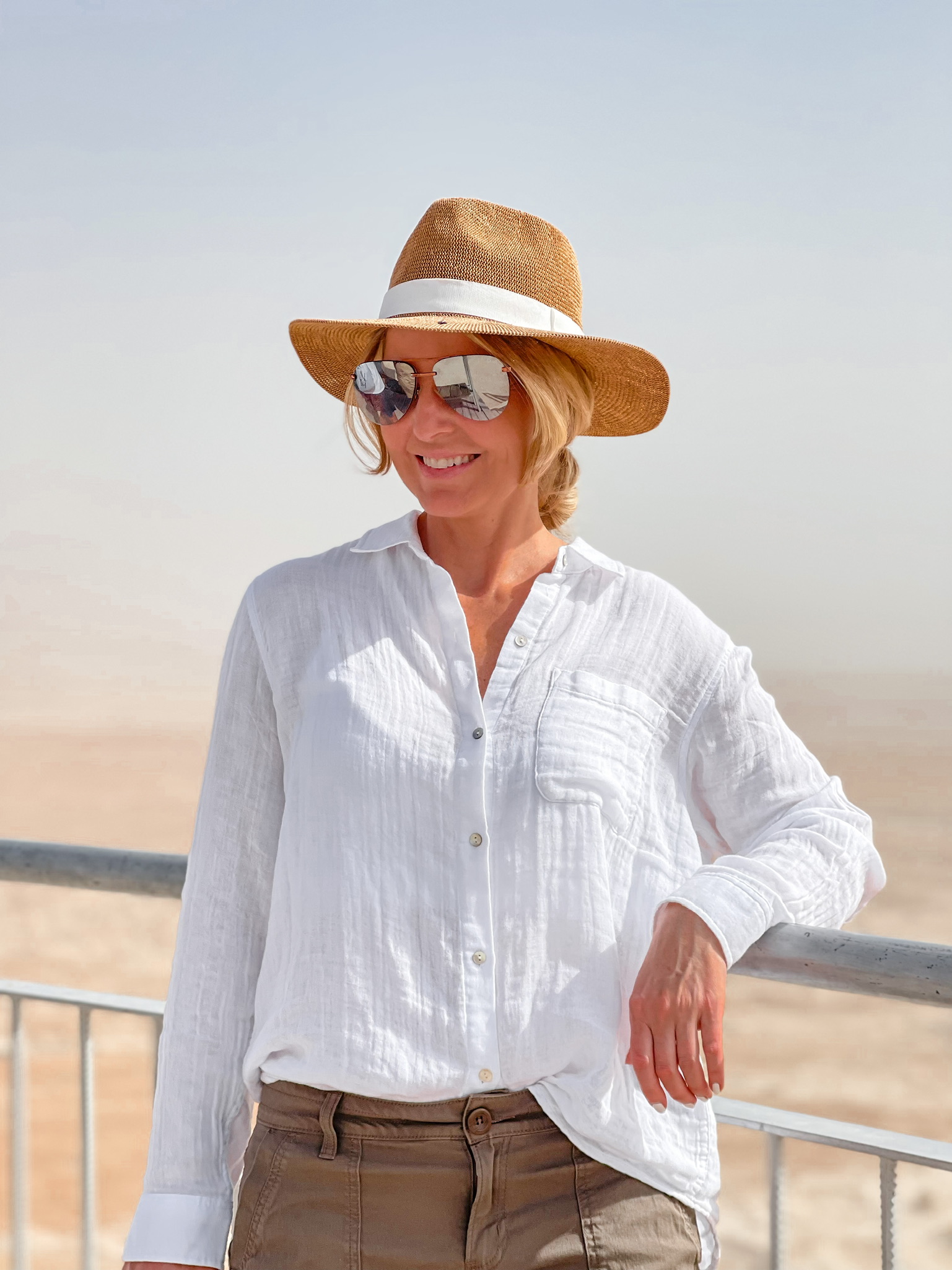 how to dress in middle east, womens dress code in middle east, middle eastern dress female, how to blend in in the middle east, shoes to wear in middle east, what to wear in middle east, how to look stylish in middle east, erin busbee, busbee style, hiking masada, hiking in west bank, rails cotton ellis shirt, backcountry green shorts, quay aviator sunglasses, hariatt isles hat, chloe sneakers