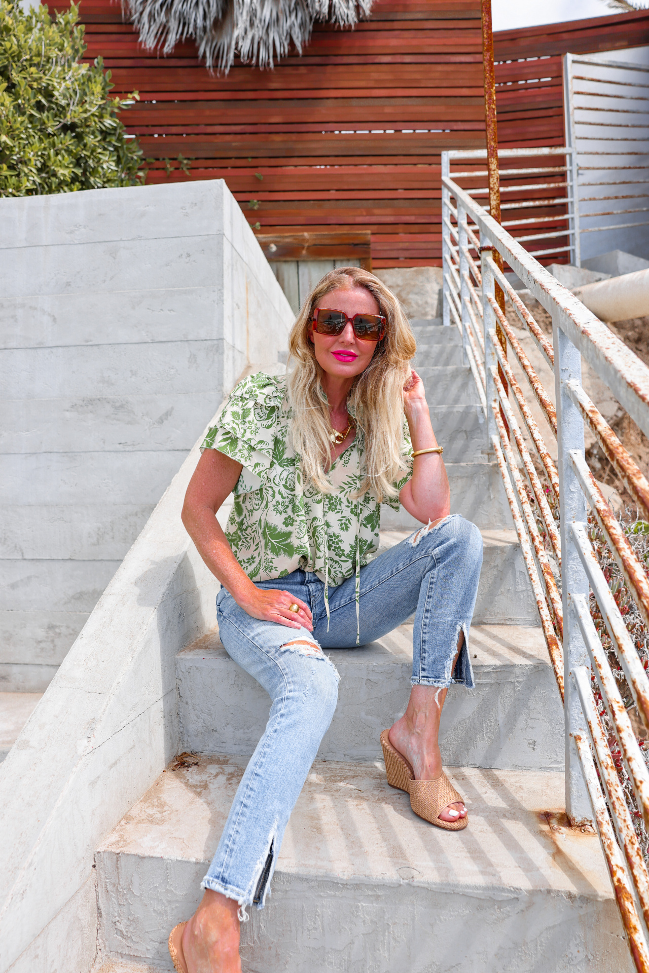 summer mom style, best summer mom outfits, summer mom outfits 2022, casual mom outfits summer, stylish mom outfits 2022, fashion for moms in their 30s, fashion for moms in their 40s, cute mom outfits, casual mom outfits, erin busbee, busbee style, fashion over 40, malibu, california, hunter bell green printed mille top, moussy vintage ithan jeans, veronica beard woven wedges, saint laurent square sunglasses, paco rabbane chunky gold necklace