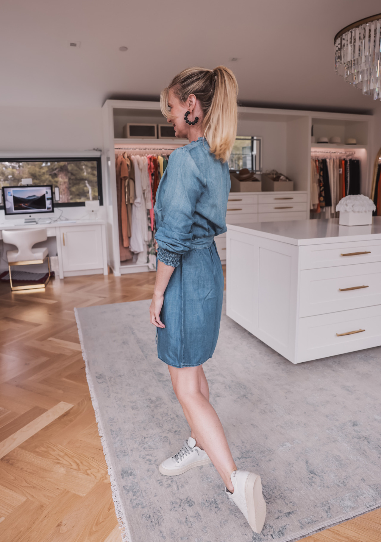 blue chambray dress with tie waist and white leather sneakers