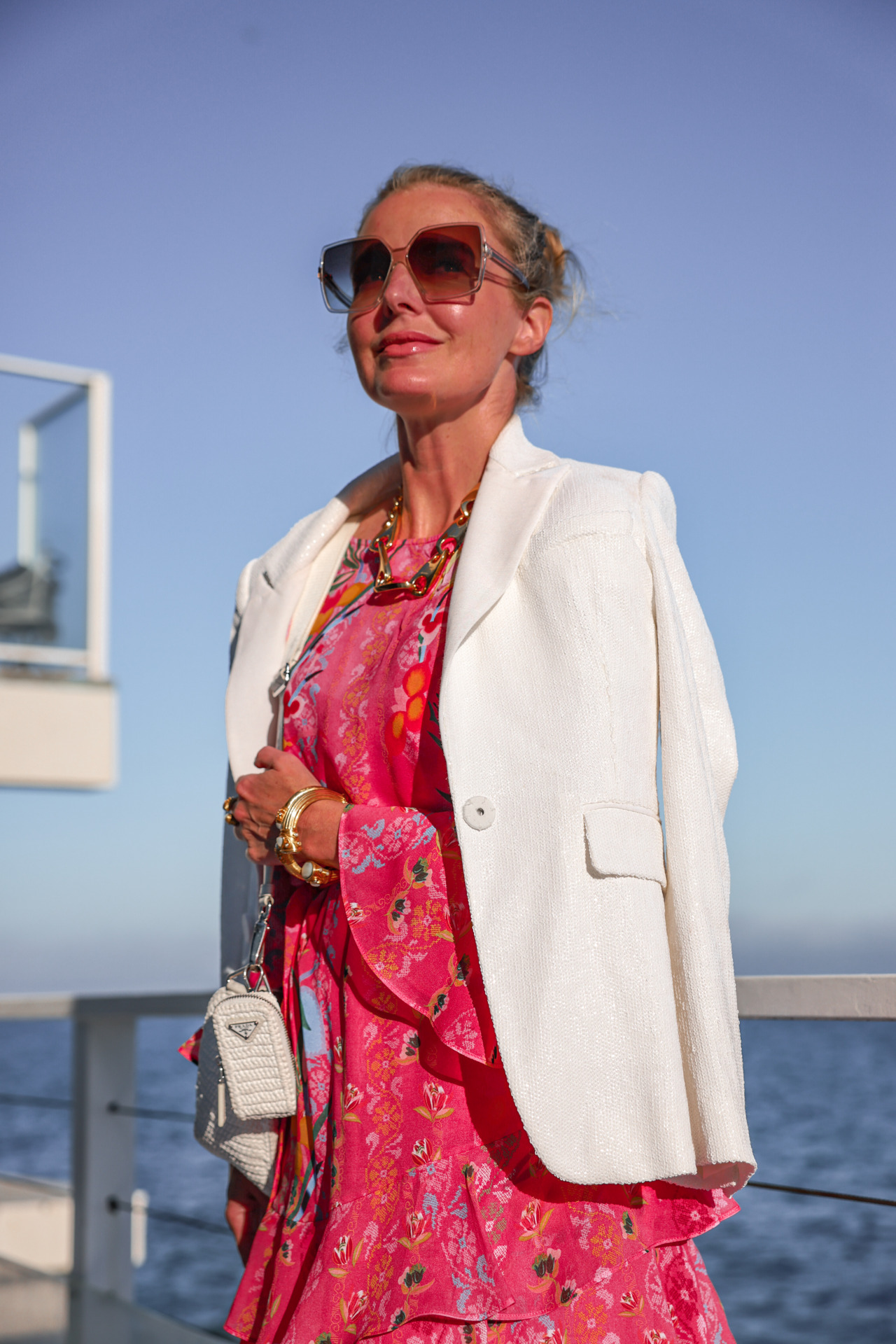 Expand time, reduce anxiety with fashion over 40 blogger Erin Busbee at Malibu beach in Saloni pink floral dress