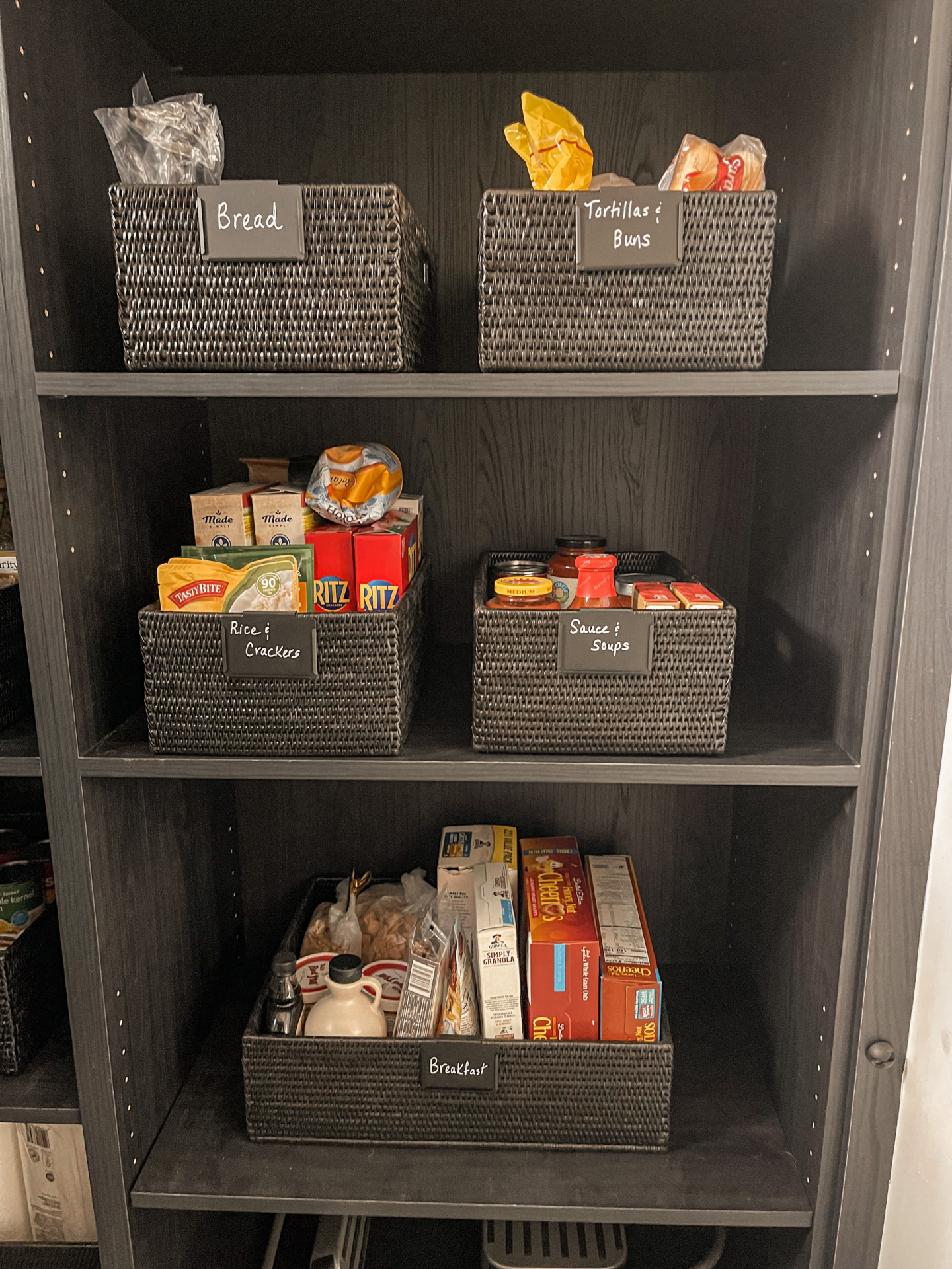 perfect pantry organization, clutter-free pantry, how to organize a pantry, keep your pantry organized, best baskets for pantry organization, clean pantry, rattan baskets, storage bins, labeled storage bins for pantry, erin Busbee, Busbee style, fashion over 40, telluride, CO