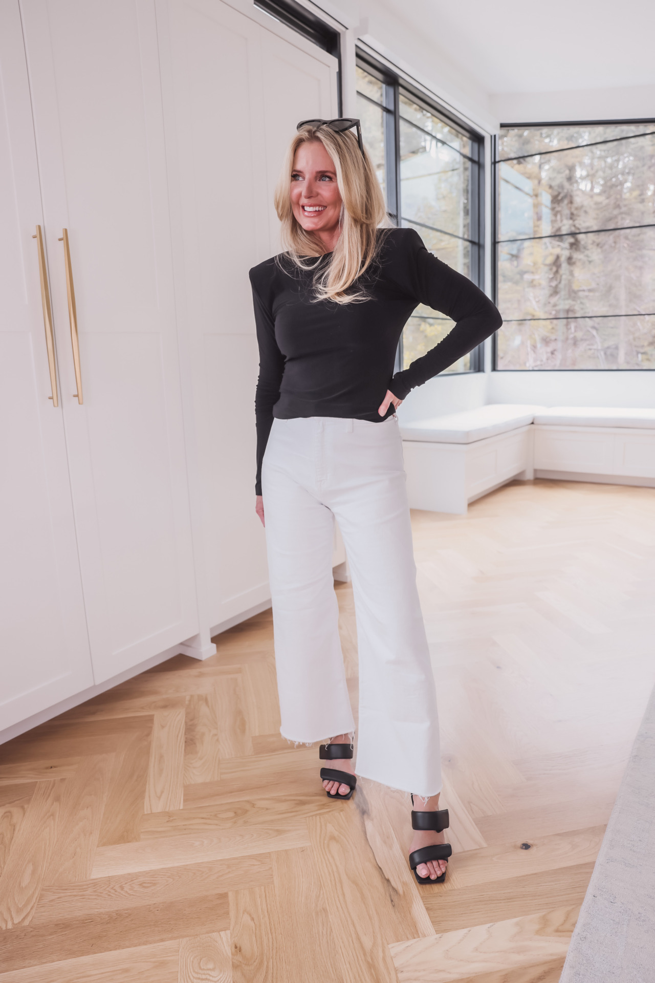 statement black top with white pants