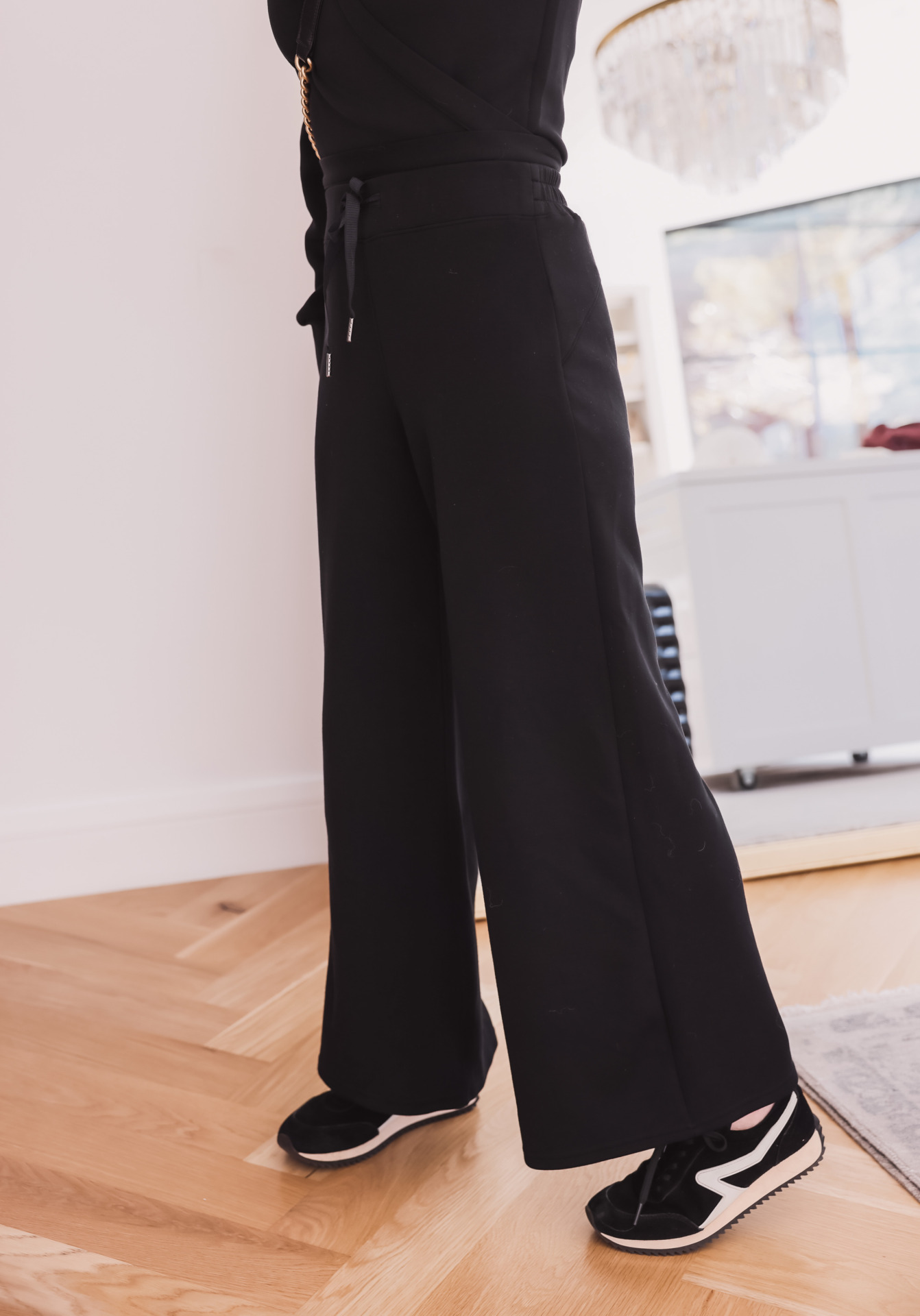 The perfect travel outfit for a long flight! ✈️ These Spanx Air Essentials  wide leg pants and half zip sweatshirt will keep me cozy