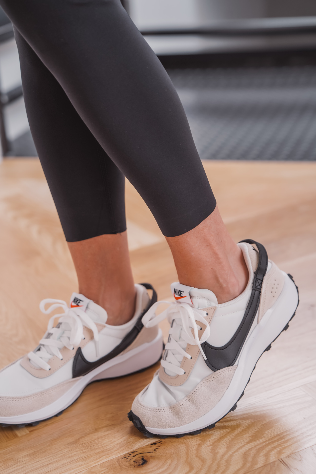 leggings and Nike sneakers