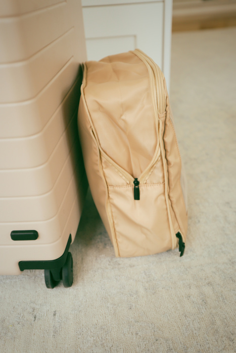 use compression cubes in half your suitcase to pack lighter